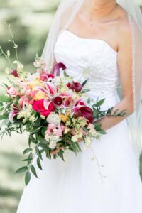 bride holding flowers